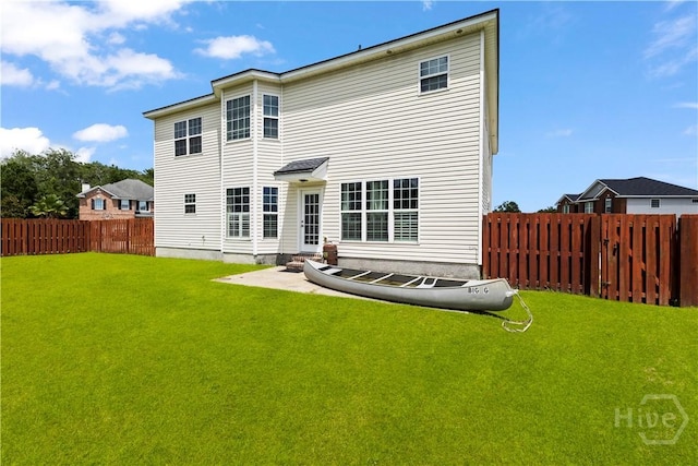 219 Byron Dr, Richmond Hill, GA 31324 - back of property featuring a fenced backyard and a patio