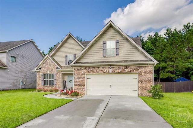 172 Green Paddock Cir, Guyton, GA 31312 - view of front of home with brick siding, driveway, and an attached garage
