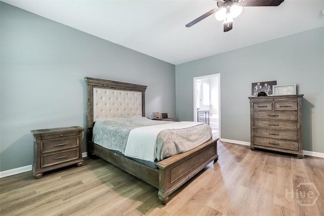 172 Green Paddock Cir, Guyton, GA 31312 - bedroom with light wood-style floors, connected bathroom, and a ceiling fan