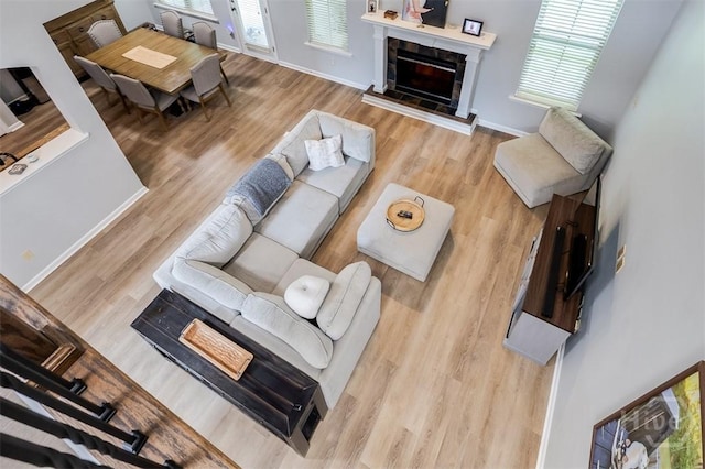 172 Green Paddock Cir, Guyton, GA 31312 - living room with wood finished floors and a tile fireplace