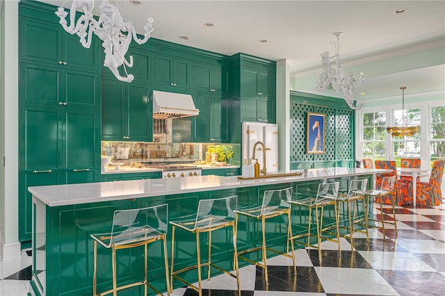 63 Magnolia Ln, Richmond Hill, GA 31324 - kitchen with a chandelier, premium range hood, light countertops, tasteful backsplash, and ornamental molding