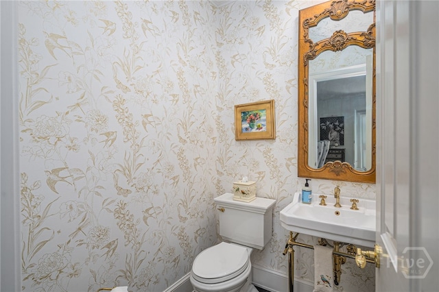 63 Magnolia Ln, Richmond Hill, GA 31324 - half bathroom with wallpapered walls