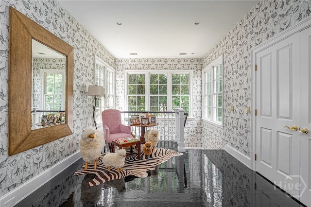 63 Magnolia Ln, Richmond Hill, GA 31324 - sitting room featuring wallpapered walls and baseboards