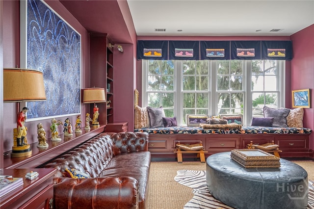63 Magnolia Ln, Richmond Hill, GA 31324 - carpeted living area featuring plenty of natural light