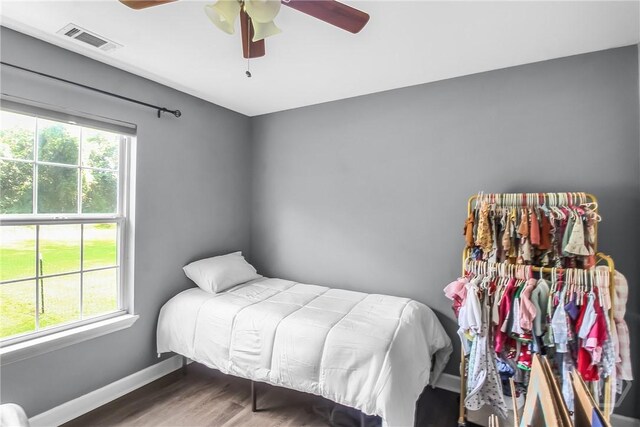 324 Elm St, Eden, GA 31307 - bedroom with wood finished floors and a ceiling fan