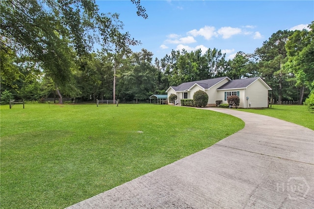324 Elm St, Eden, GA 31307 - view of front of property featuring a front lawn, driveway, and view of wooded area