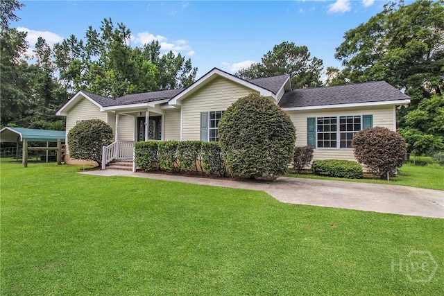 324 Elm St, Eden, GA 31307 - view of front of house with a front lawn and roof with shingles