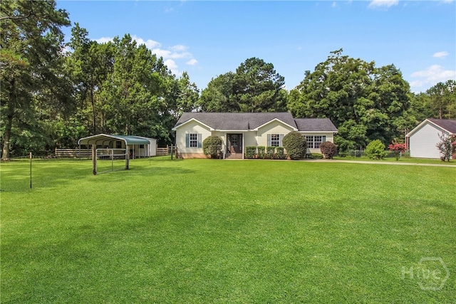 324 Elm St, Eden, GA 31307 - view of front facade with a detached carport and view of scattered trees