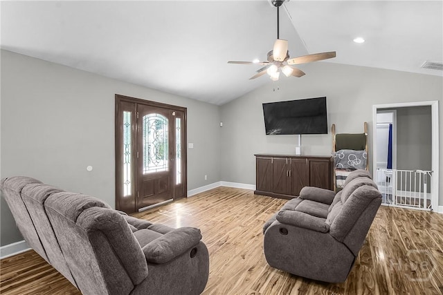 324 Elm St, Eden, GA 31307 - living area featuring lofted ceiling, wood finished floors, and a ceiling fan