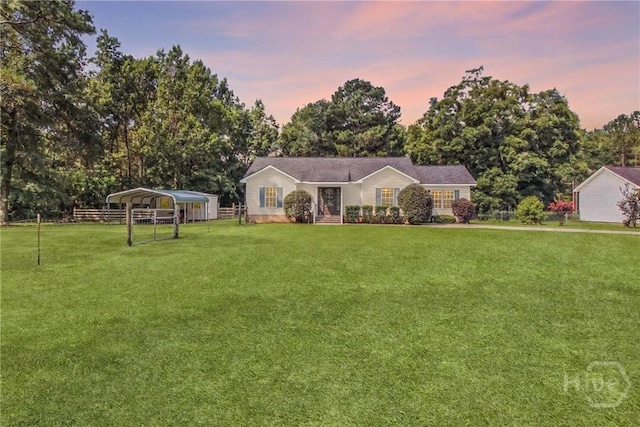 324 Elm St, Eden, GA 31307 - view of front of property with a detached carport and view of wooded area