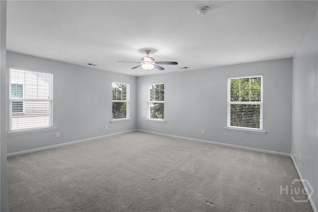 129 Winslow Cir, Savannah, GA 31407 - carpeted spare room with a ceiling fan, healthy amount of natural light, and a smoke detector