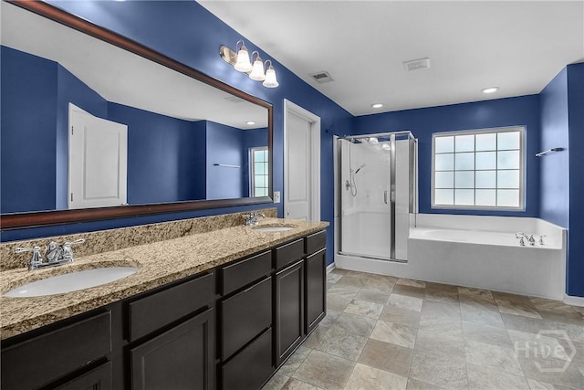 129 Winslow Cir, Savannah, GA 31407 - full bathroom featuring a stall shower, healthy amount of natural light, a garden tub, and double vanity