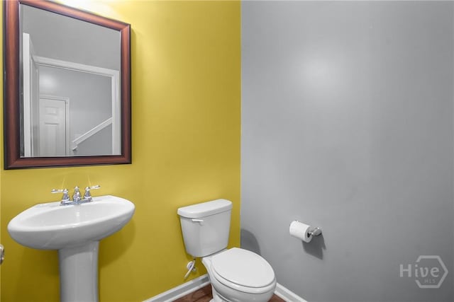 129 Winslow Cir, Savannah, GA 31407 - half bathroom featuring toilet and baseboards