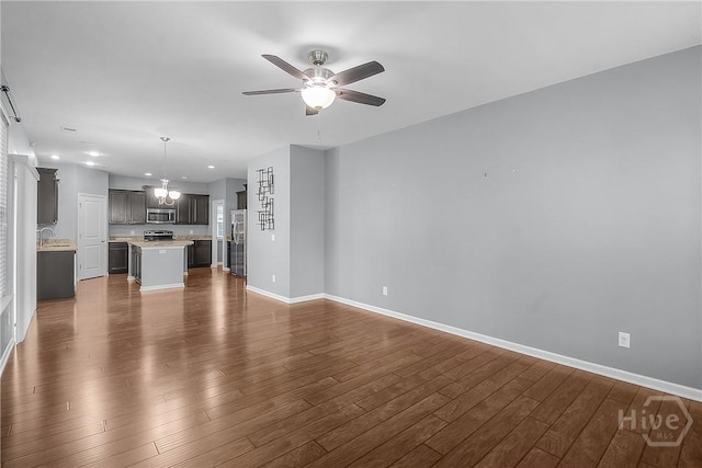 129 Winslow Cir, Savannah, GA 31407 - unfurnished living room featuring a ceiling fan, dark wood-type flooring, and recessed lighting