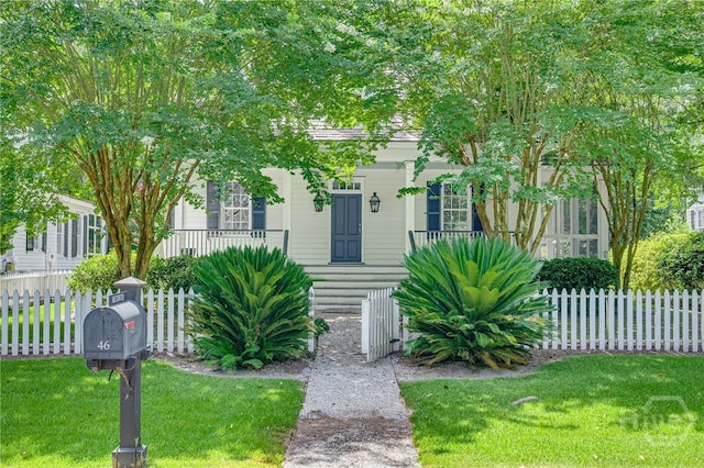 46 Cherry Laurel Ln, Richmond Hill, GA 31324 - view of property hidden behind natural elements with a porch
