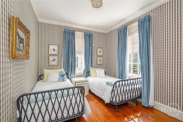46 Cherry Laurel Ln, Richmond Hill, GA 31324 - bedroom featuring wallpapered walls, wood finished floors, and ornamental molding