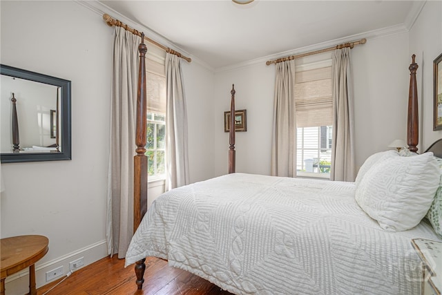 46 Cherry Laurel Ln, Richmond Hill, GA 31324 - bedroom with wood finished floors and ornamental molding