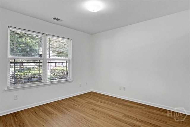 93 Lake Shore Blvd, Port Wentworth, GA 31407 - spare room with baseboards and wood finished floors