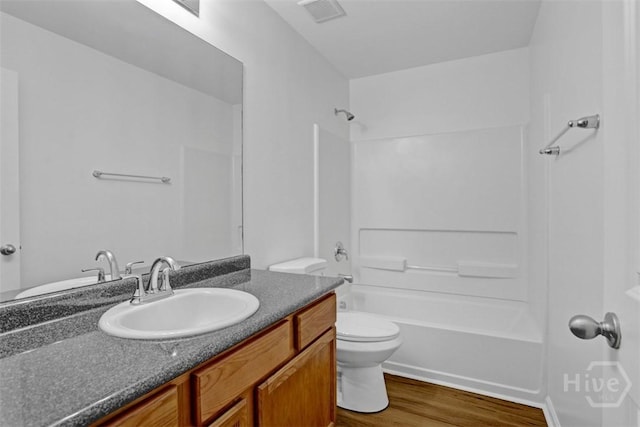 93 Lake Shore Blvd, Port Wentworth, GA 31407 - full bathroom featuring vanity, shower / tub combination, and wood finished floors