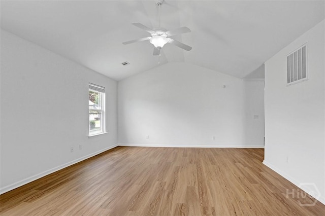 93 Lake Shore Blvd, Port Wentworth, GA 31407 - empty room featuring light wood-style flooring, lofted ceiling, and a ceiling fan