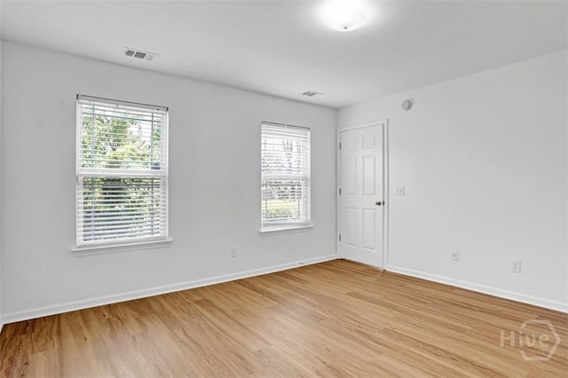93 Lake Shore Blvd, Port Wentworth, GA 31407 - unfurnished room featuring light wood-type flooring and plenty of natural light