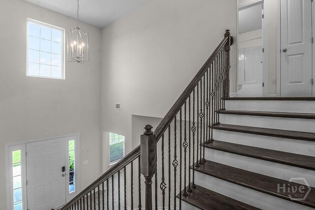 105 Telford St, Savannah, GA 31407 - stairs with a chandelier, healthy amount of natural light, and a towering ceiling