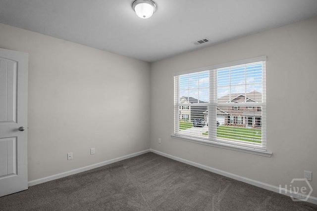 105 Telford St, Savannah, GA 31407 - carpeted spare room with baseboards