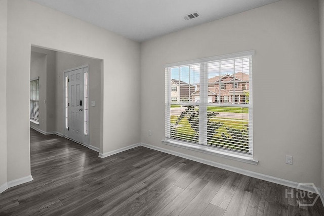 105 Telford St, Savannah, GA 31407 - unfurnished room with dark wood-style floors and baseboards