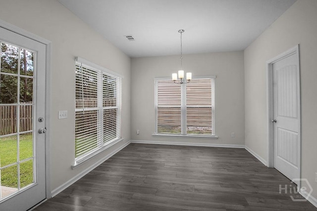 105 Telford St, Savannah, GA 31407 - unfurnished dining area featuring a chandelier and dark wood-style flooring