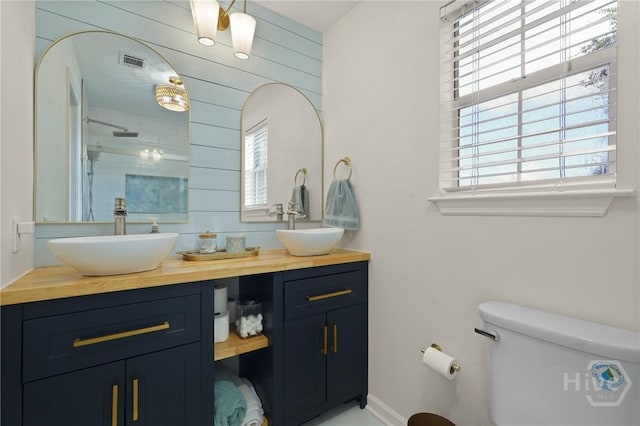 139 Marsh Edge Ln, Savannah, GA 31419 - bathroom with double vanity, healthy amount of natural light, and tiled shower