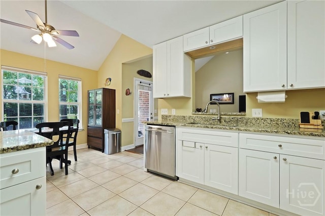 27 Heron View Ct, Richmond Hill, GA 31324 - kitchen featuring stainless steel dishwasher, lofted ceiling, ceiling fan, white cabinetry, and light stone counters