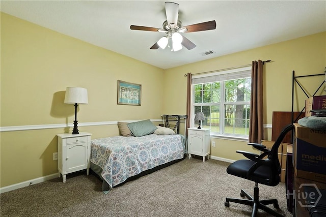 27 Heron View Ct, Richmond Hill, GA 31324 - bedroom featuring dark colored carpet and ceiling fan