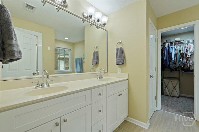 27 Heron View Ct, Richmond Hill, GA 31324 - full bathroom with double vanity and a spacious closet