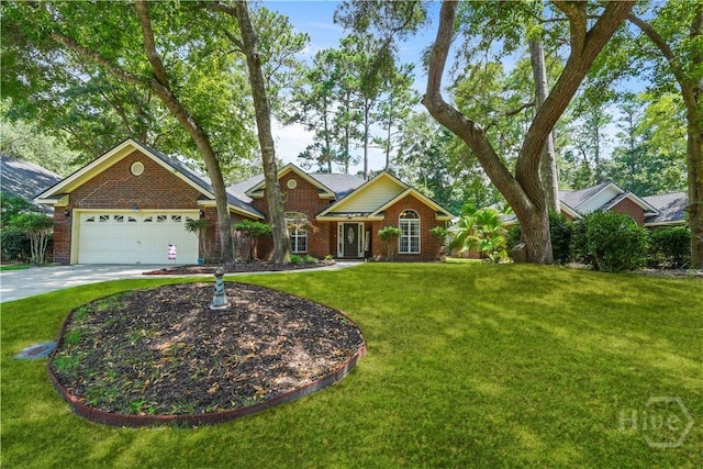 27 Heron View Ct, Richmond Hill, GA 31324 - view of front of house with brick siding, a garage, a front lawn, and driveway