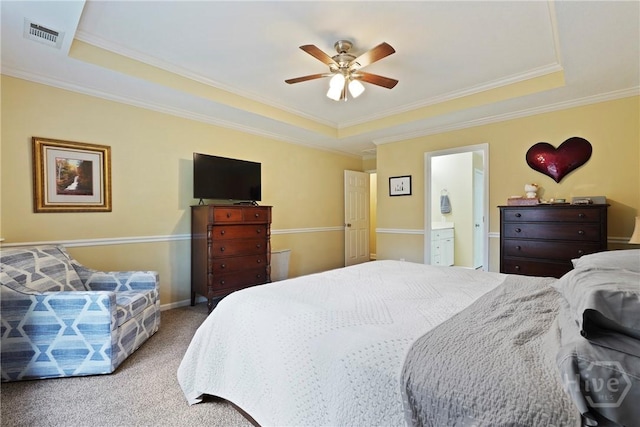 27 Heron View Ct, Richmond Hill, GA 31324 - bedroom featuring a tray ceiling, crown molding, carpet flooring, a ceiling fan, and ensuite bathroom