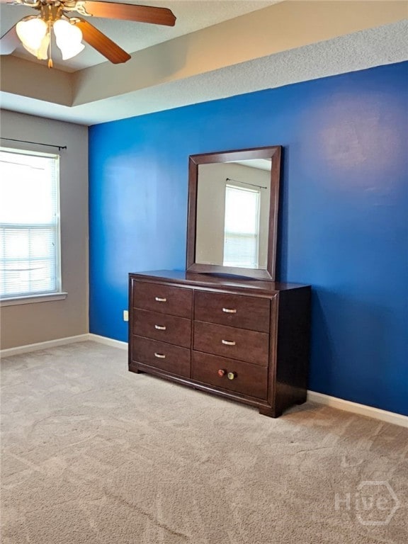 401 Barry Mccaffrey Blvd Unit E2, Hinesville, GA 31313 - unfurnished bedroom with light colored carpet and a ceiling fan