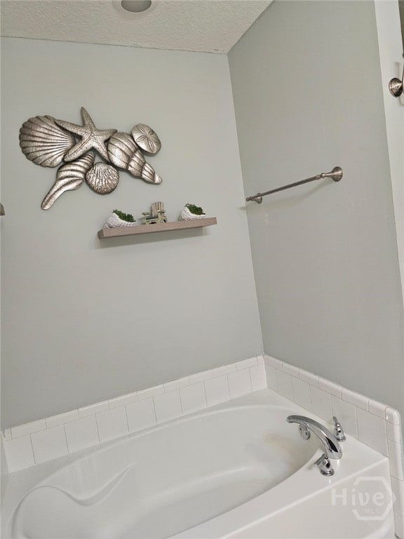 401 Barry Mccaffrey Blvd Unit E2, Hinesville, GA 31313 - bathroom featuring a garden tub