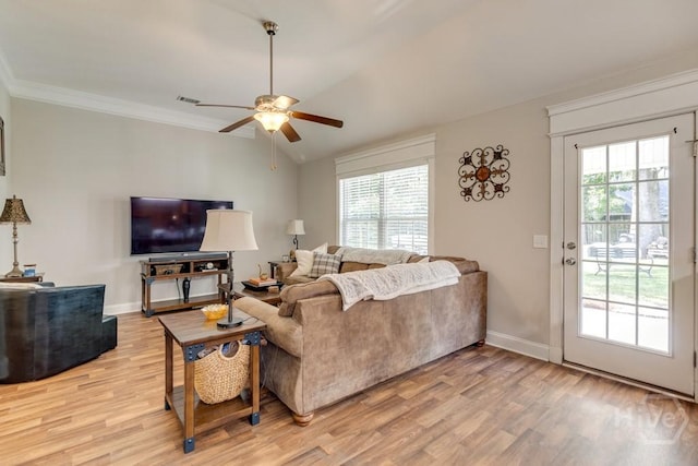 160 Wild Honey Ct, Richmond Hill, GA 31324 - living room with plenty of natural light, light wood-type flooring, ceiling fan, vaulted ceiling, and crown molding