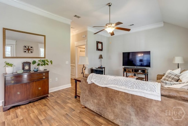 160 Wild Honey Ct, Richmond Hill, GA 31324 - living room featuring wood finished floors, ceiling fan, crown molding, and vaulted ceiling