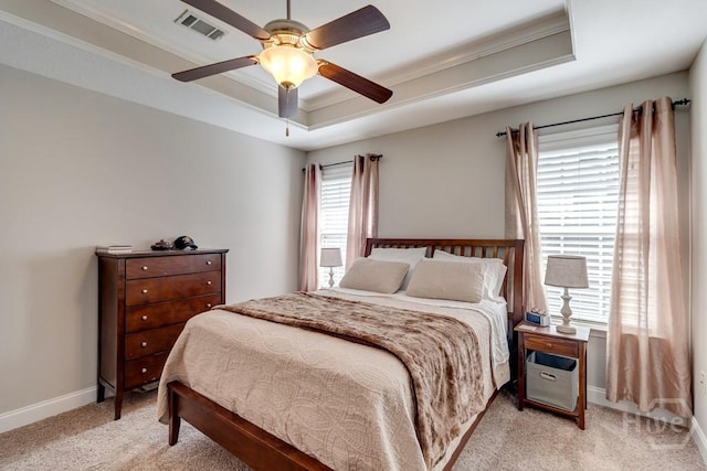 160 Wild Honey Ct, Richmond Hill, GA 31324 - bedroom featuring a raised ceiling, light carpet, crown molding, and a ceiling fan