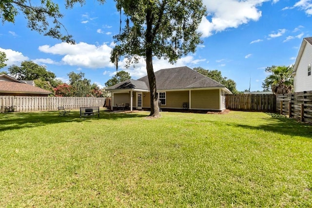 160 Wild Honey Ct, Richmond Hill, GA 31324 - rear view of house with a fenced backyard