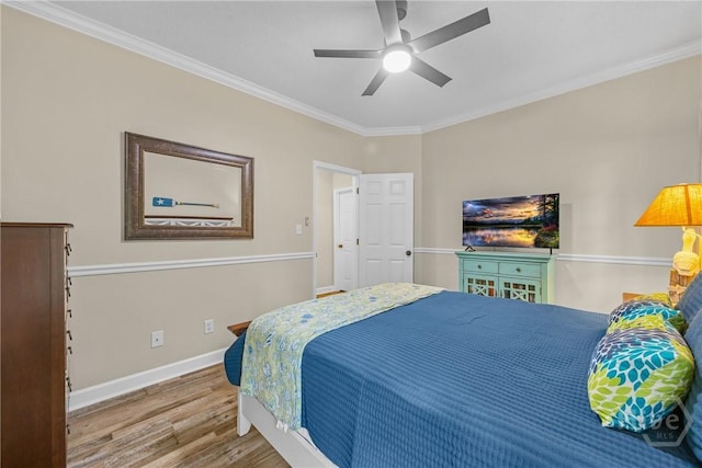 139 Mingarry Dr, Richmond Hill, GA 31324 - bedroom with wood finished floors, ornamental molding, and a ceiling fan