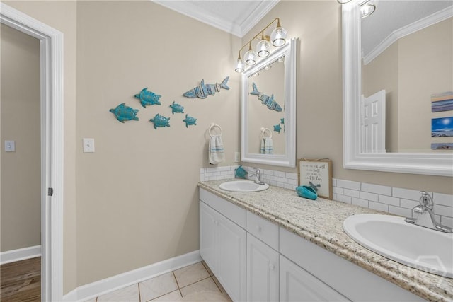 139 Mingarry Dr, Richmond Hill, GA 31324 - bathroom featuring ornamental molding, backsplash, and double vanity
