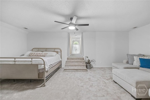 139 Mingarry Dr, Richmond Hill, GA 31324 - bedroom with a textured ceiling, carpet floors, and ceiling fan