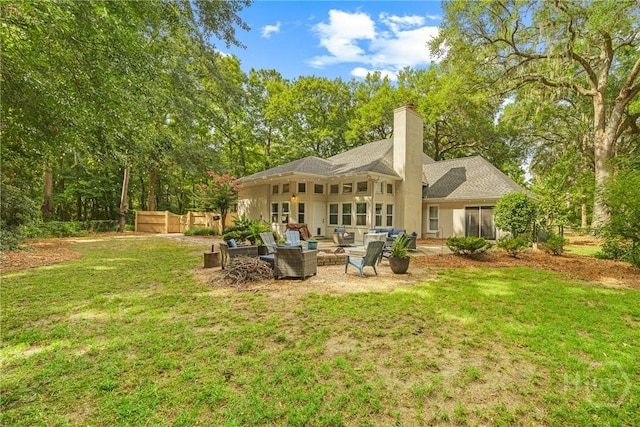 139 Mingarry Dr, Richmond Hill, GA 31324 - rear view of property with outdoor lounge area, a chimney, and a patio