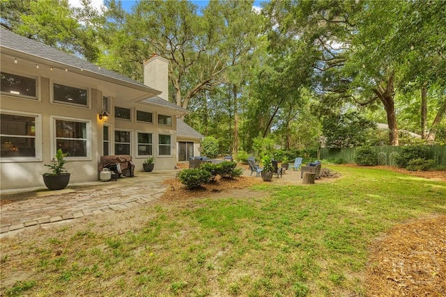 139 Mingarry Dr, Richmond Hill, GA 31324 - view of yard featuring a patio area
