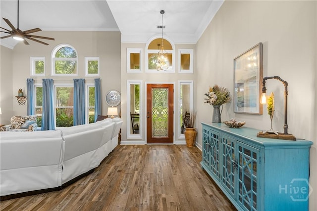 139 Mingarry Dr, Richmond Hill, GA 31324 - entrance foyer featuring ornamental molding, wood finished floors, a ceiling fan, and a towering ceiling