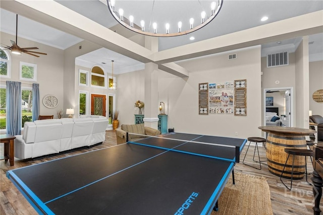 139 Mingarry Dr, Richmond Hill, GA 31324 - playroom featuring a high ceiling, wood finished floors, a ceiling fan, and recessed lighting