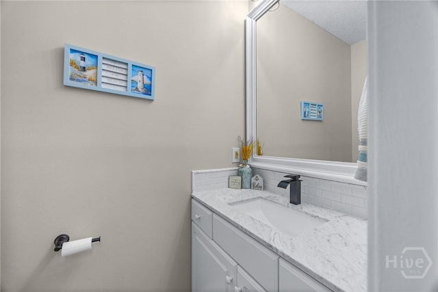 139 Mingarry Dr, Richmond Hill, GA 31324 - bathroom with vanity and tasteful backsplash