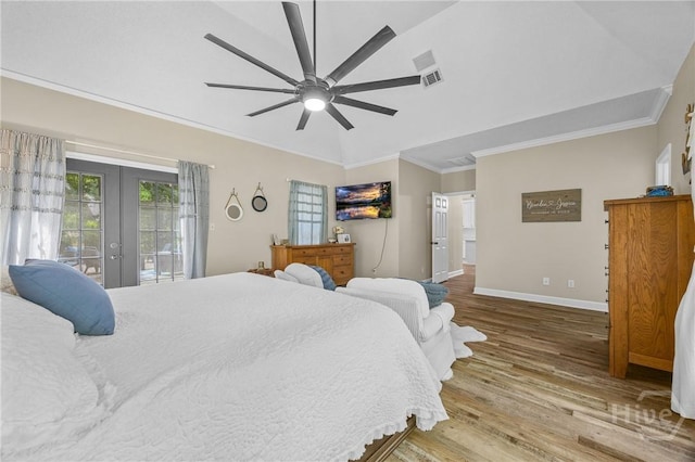 139 Mingarry Dr, Richmond Hill, GA 31324 - bedroom with french doors, access to outside, crown molding, wood finished floors, and lofted ceiling